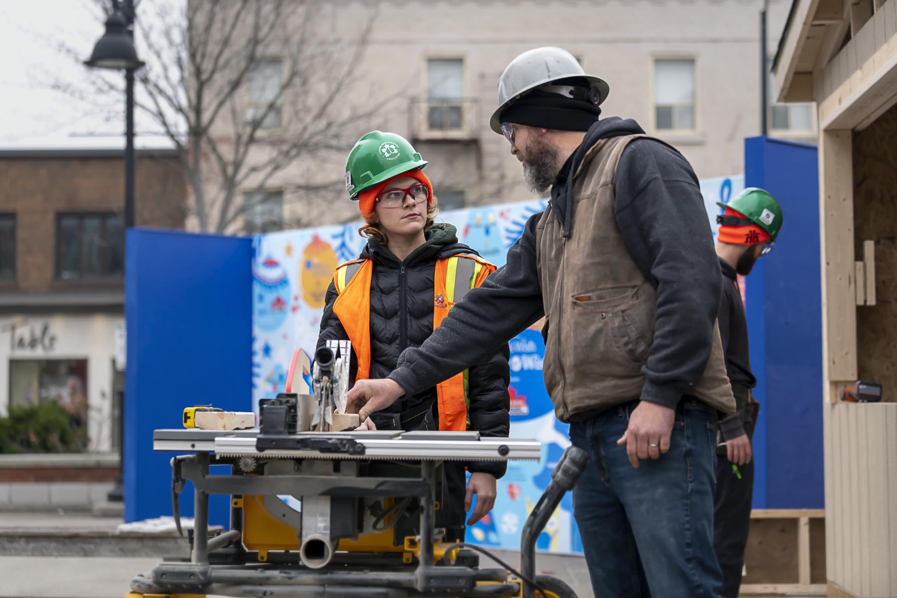 Fanshawe instructor teaching a student to use a table saw