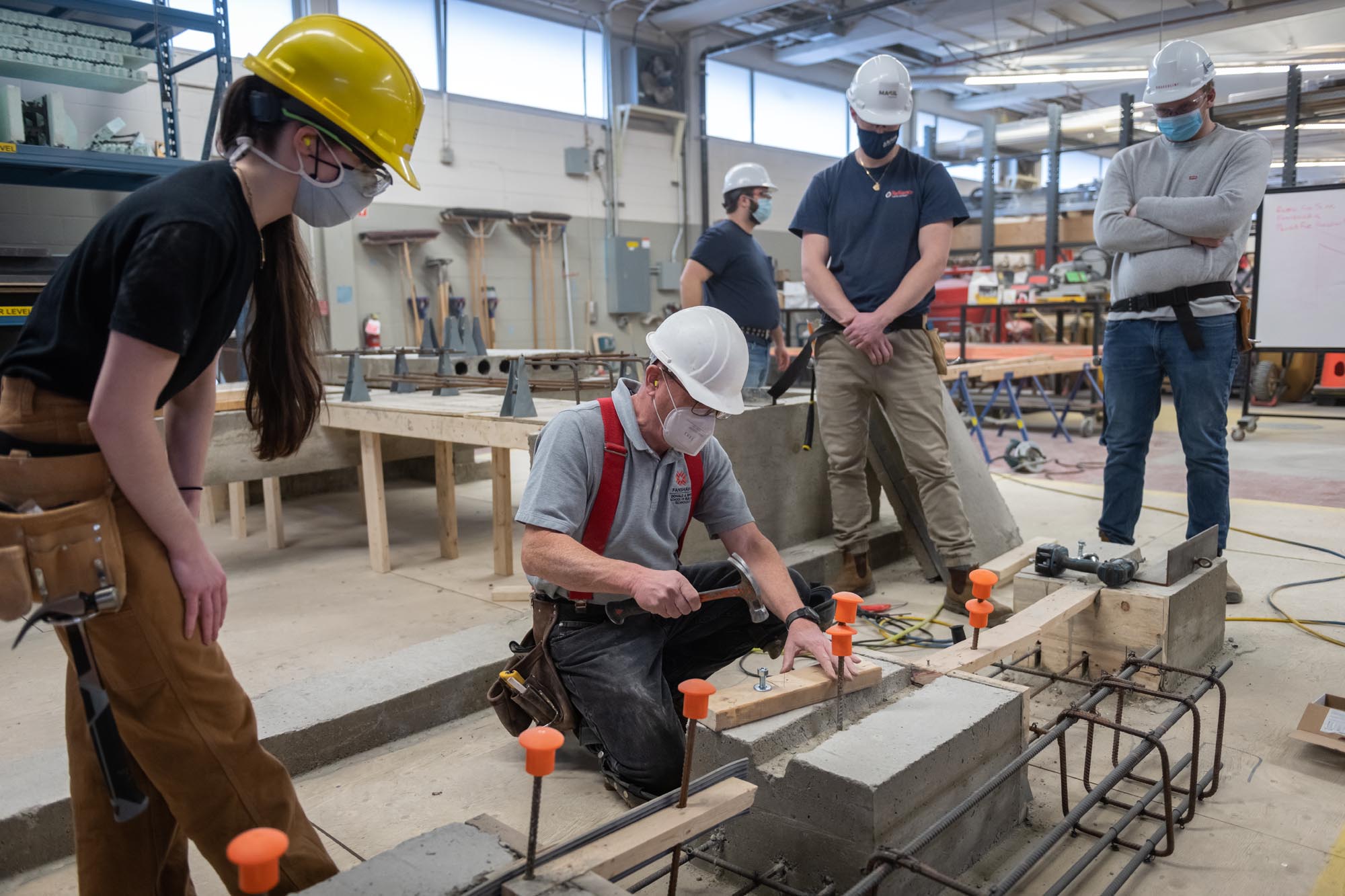 Construction Engineering students working in concrete design lab