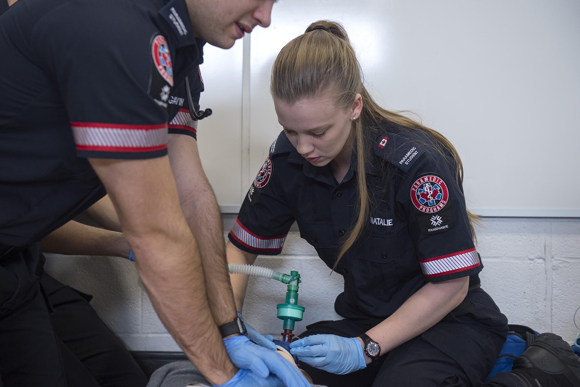 Fanshawe paramedic students working in lab