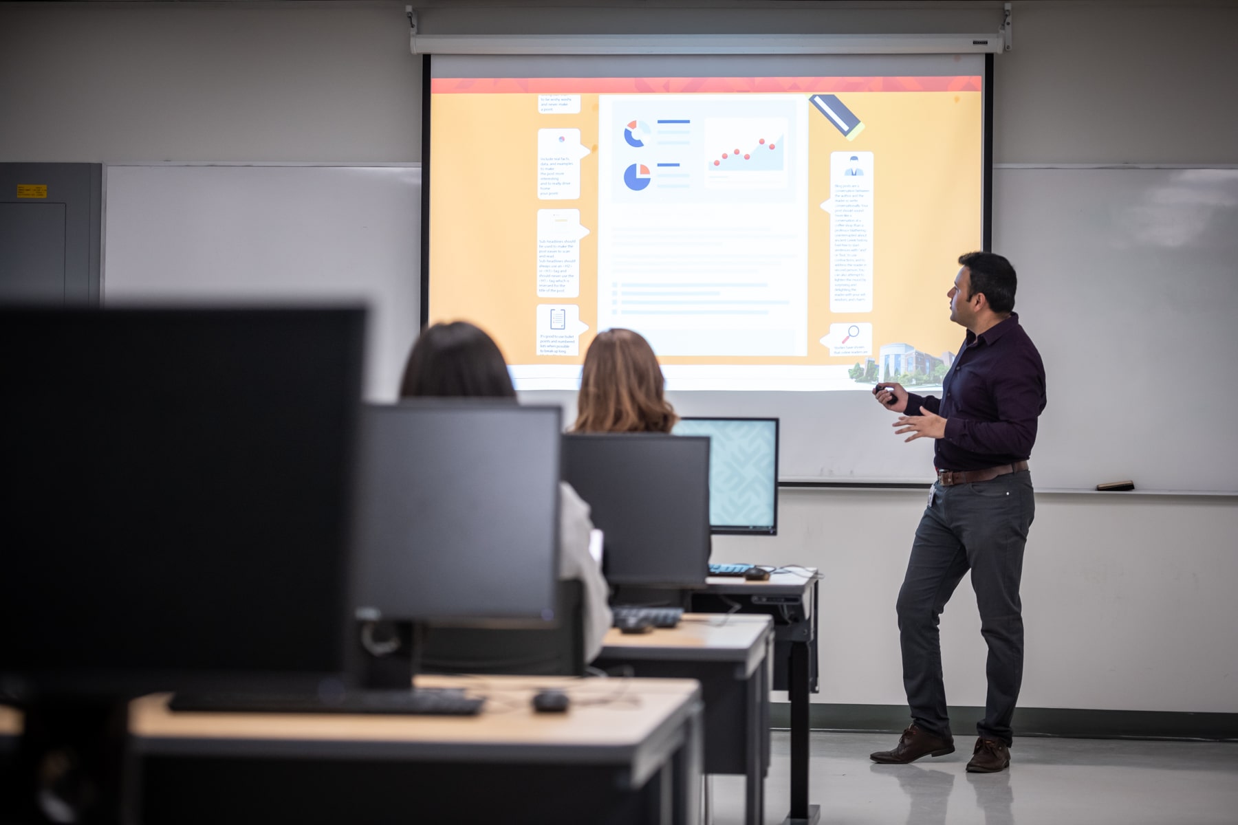professor uses projector to teach class