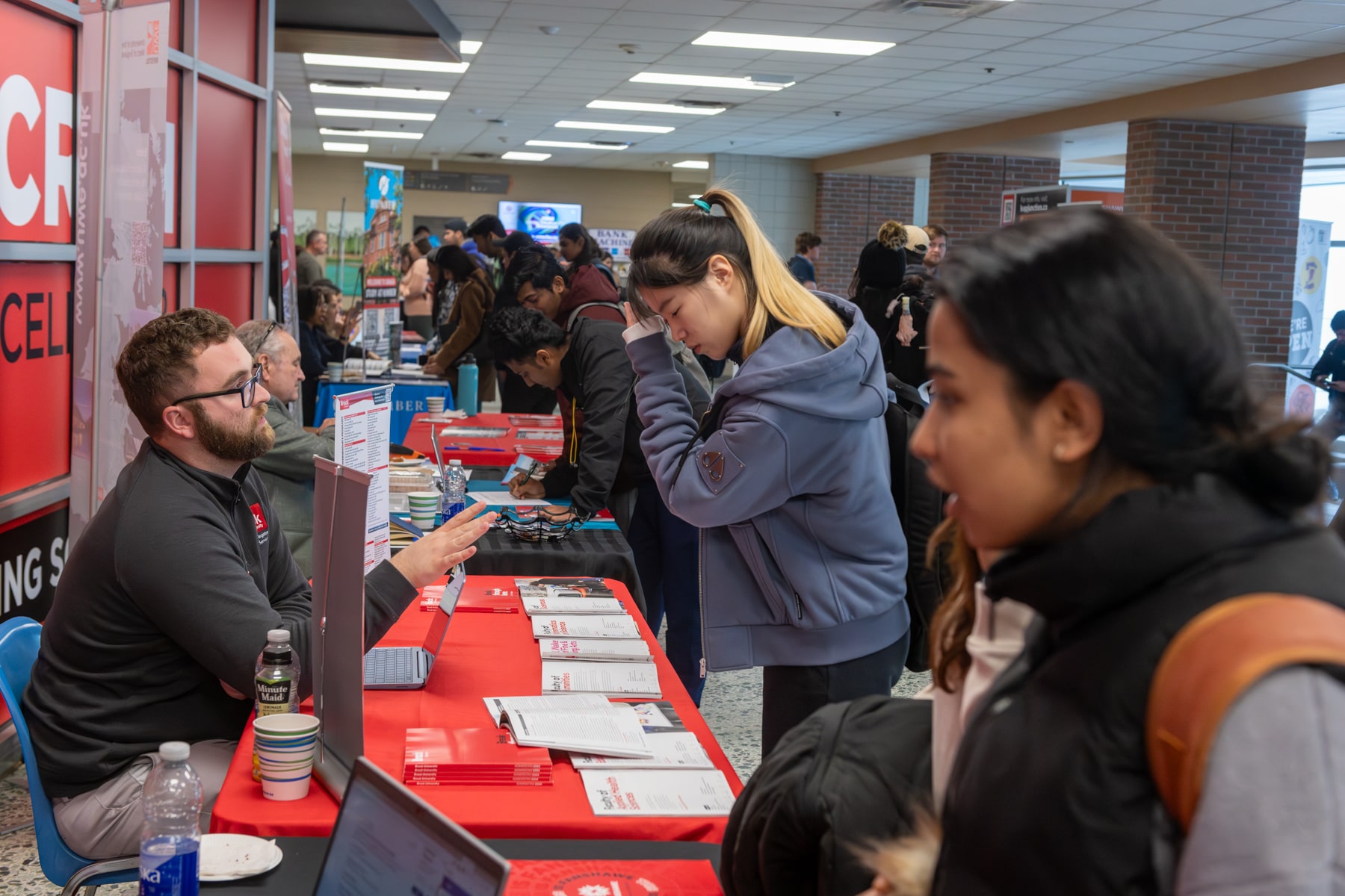 student considers educational pathway options at fanshawe's pathways fair